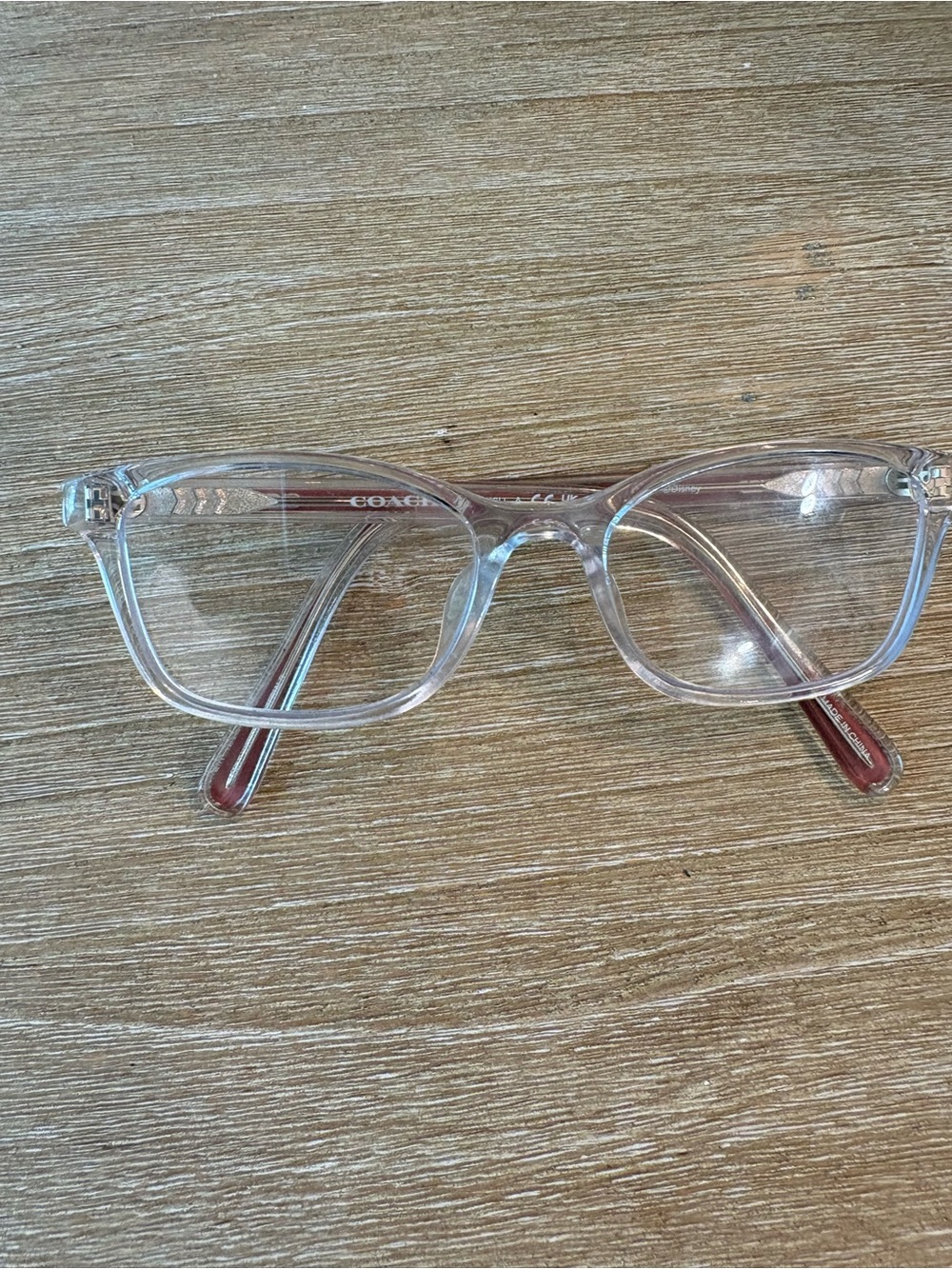 Coach Clear Frame Women’s Glasses with Red Temples
